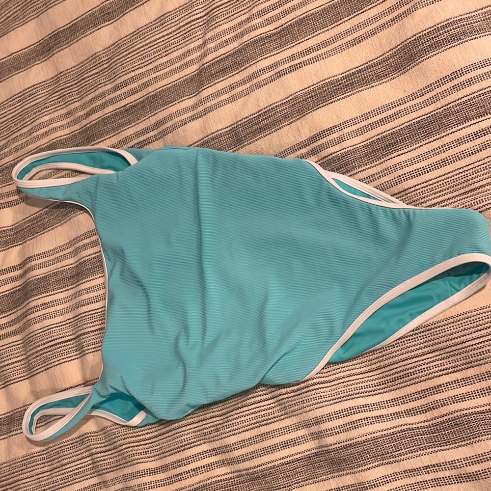 Lainsnow one piece new only tried on one time. Still has the Hygienic Liner on